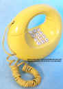 Yellow_Push-button_Loop_Phone_web.jpg (76680 bytes)